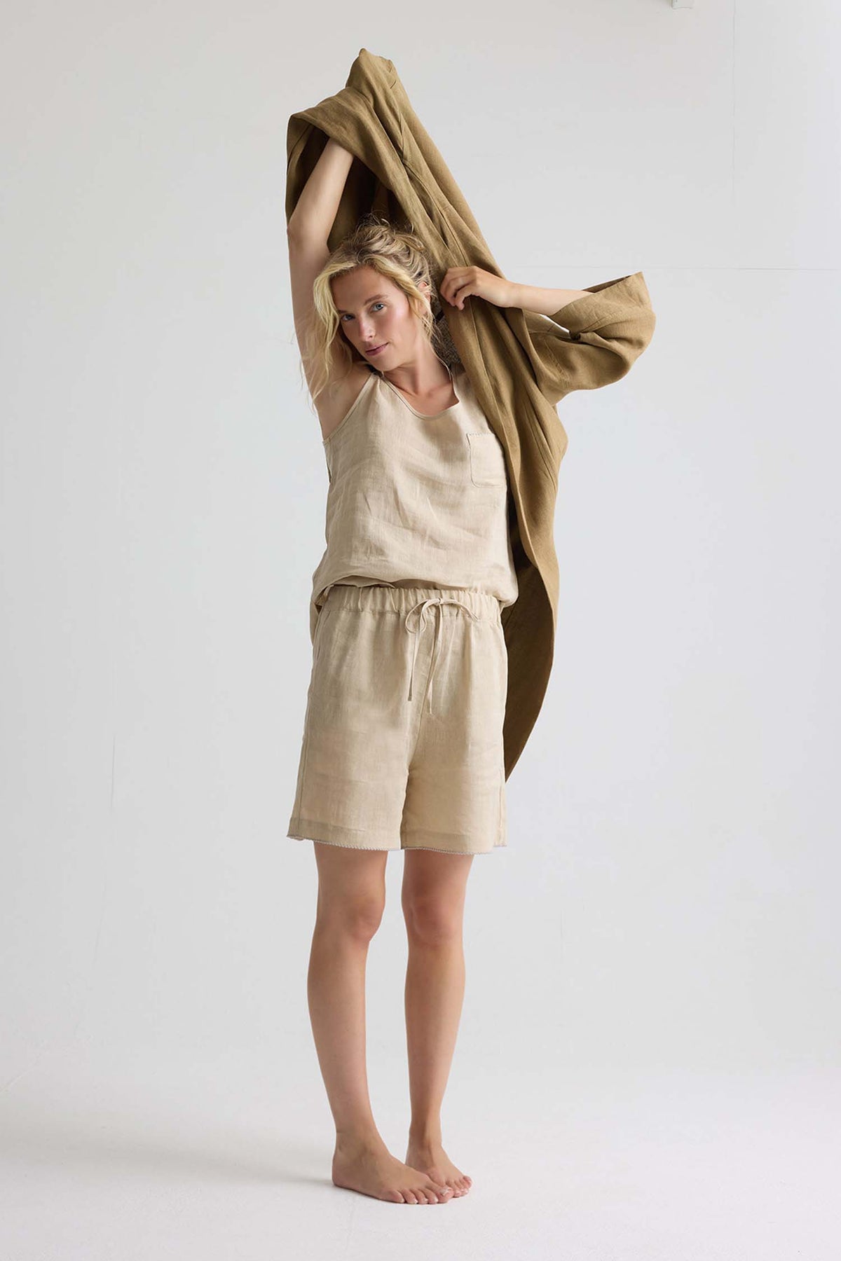 Relaxed Linen Shorts In Summer Sand