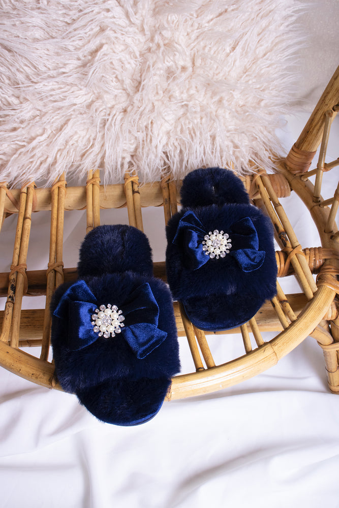 Anya women's slider slippers in navy using the softest faux furs and topped with a premium grosgrain bow finished with a jewel pearl embellishment from Pretty You London