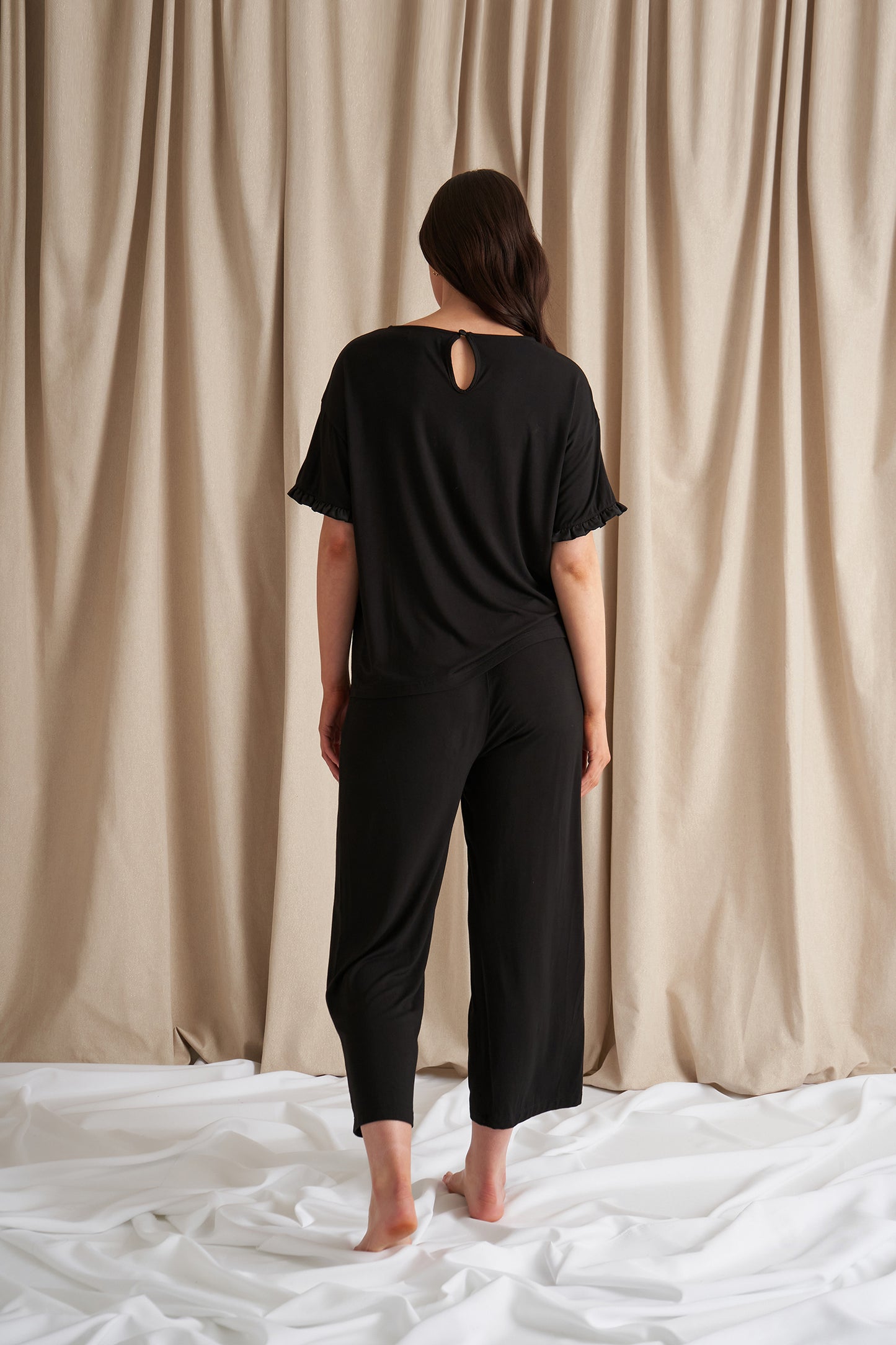 
                  
                    Bamboo Frill Tee Trouser Set in Black
                  
                