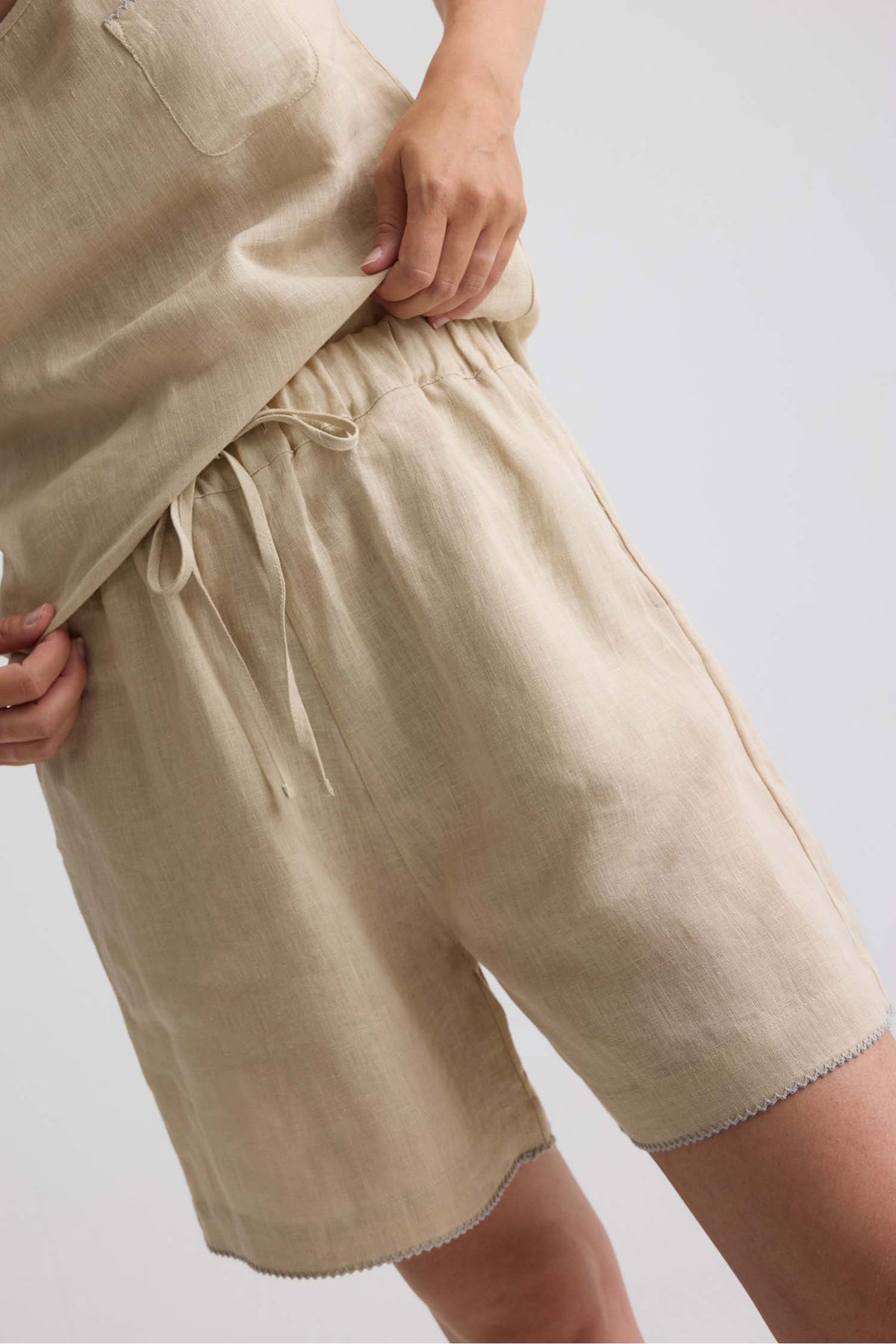 Relaxed Linen Shorts In Summer Sand