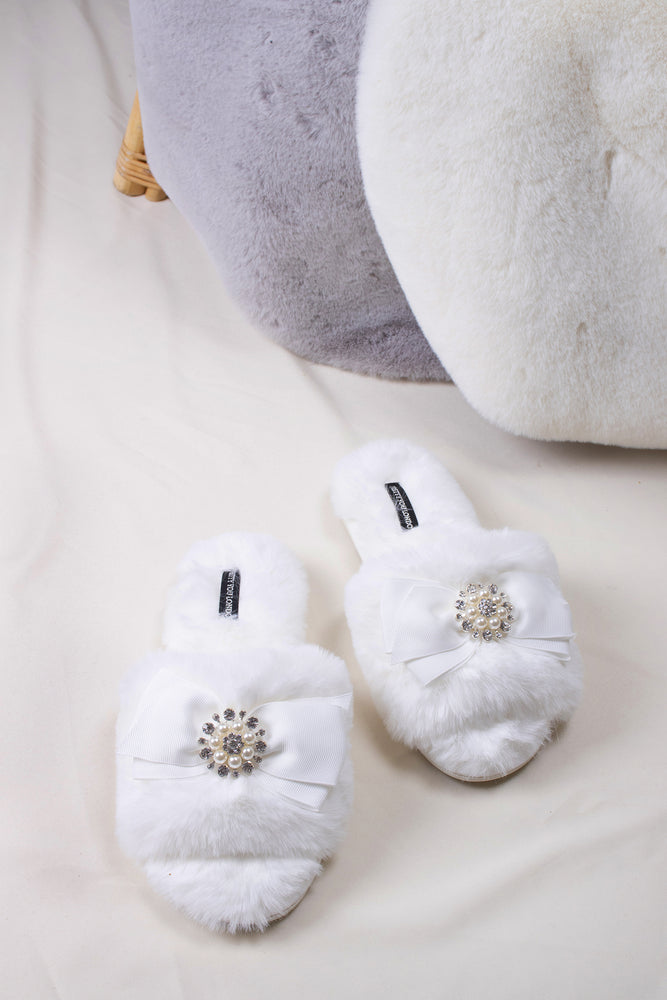 Anya women's slider slippers in cream using the softest faux furs and topped with a premium grosgrain bow finished with a jewel pearl embellishment from Pretty You London