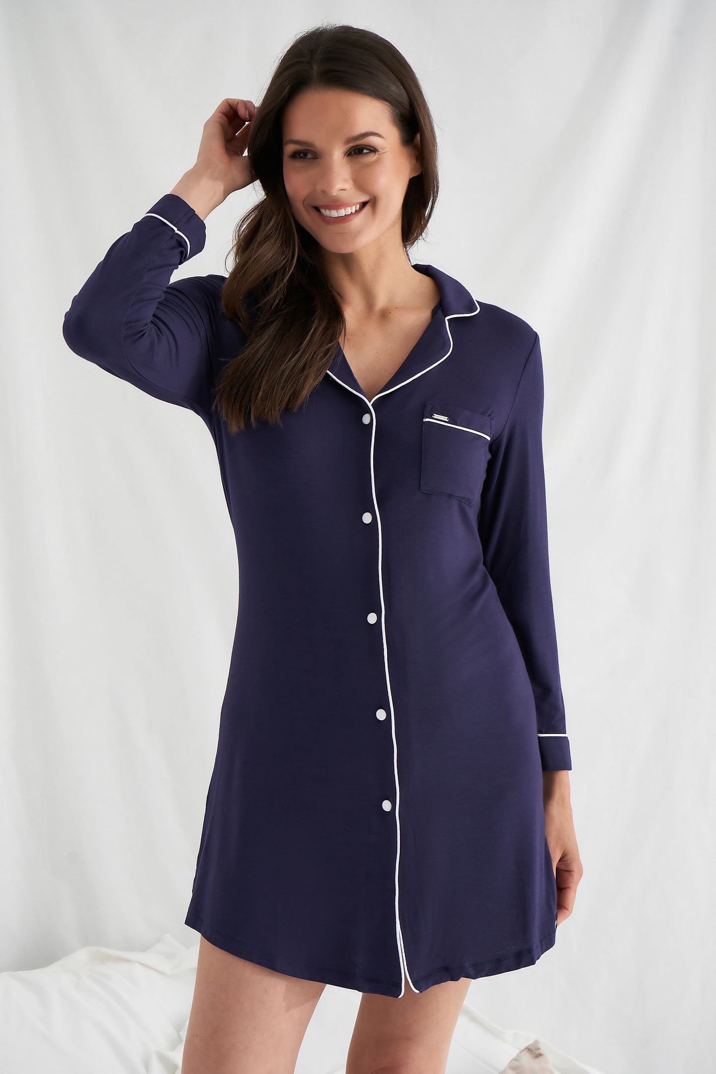 
                  
                    Women's Bamboo Nightshirt in Midnight Blue with functional button up fastening, revere collar and contrast colour piping from Pretty You London
                  
                