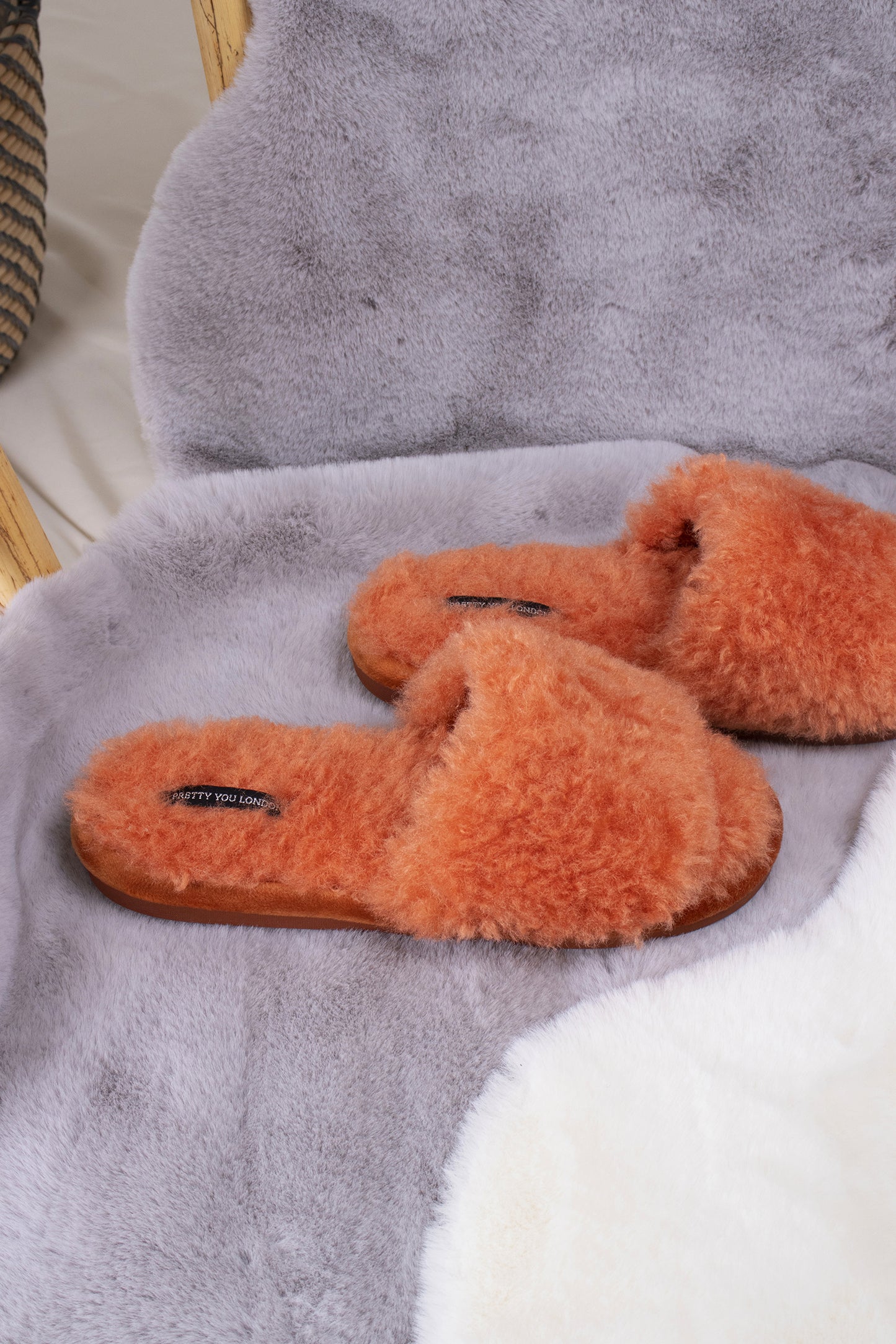 
                  
                    Candy women's open toe slider slippers in spice orange with soft faux shearling and extra thick band from Pretty You London
                  
                