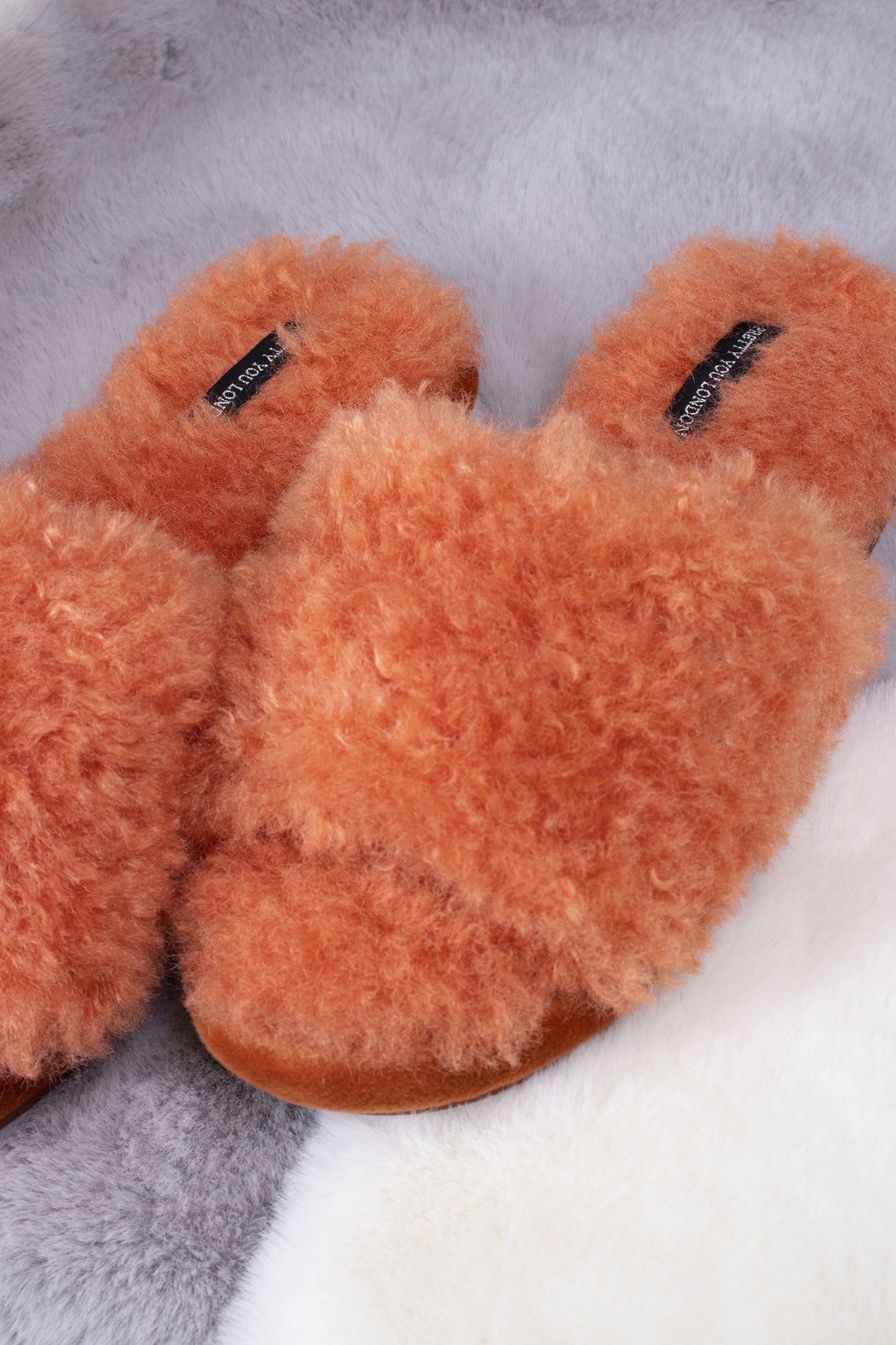 
                  
                    Candy women's open toe slider slippers in spice orange with soft faux shearling and extra thick band from Pretty You London
                  
                