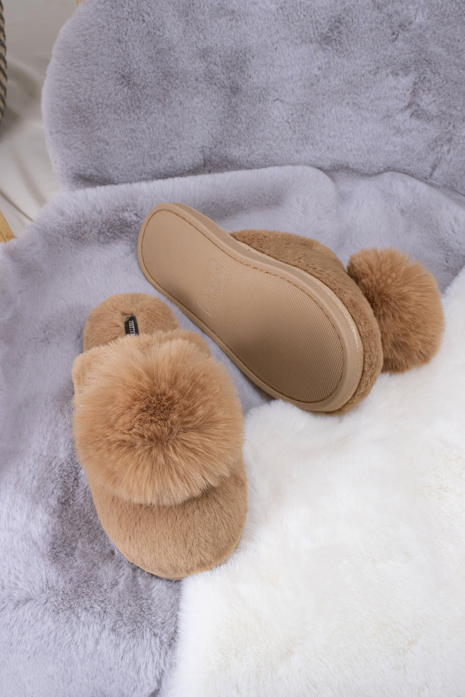 
                  
                    Etta women's mule slippers in camel with a statement oversized pom and metallic faux-suede binding from Pretty You London
                  
                