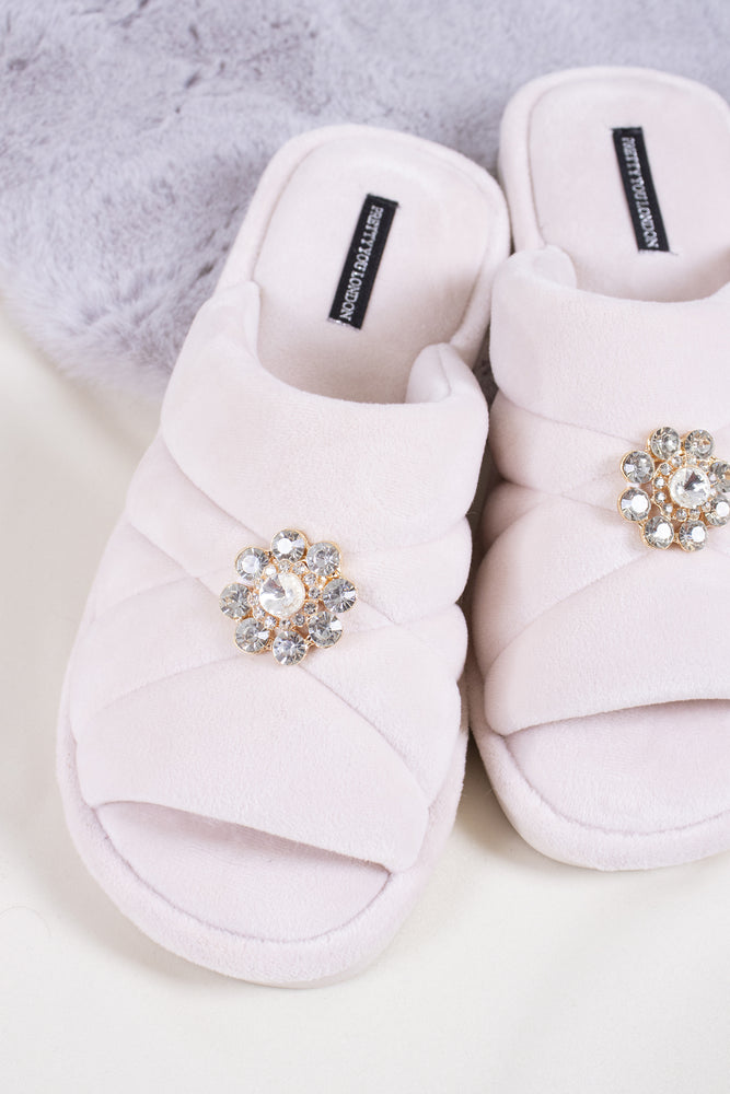 
                  
                    Faye women's slider slippers in powder puff pink combining brushed microfibre materials and a glimmering crystal brooch from Pretty You London
                  
                