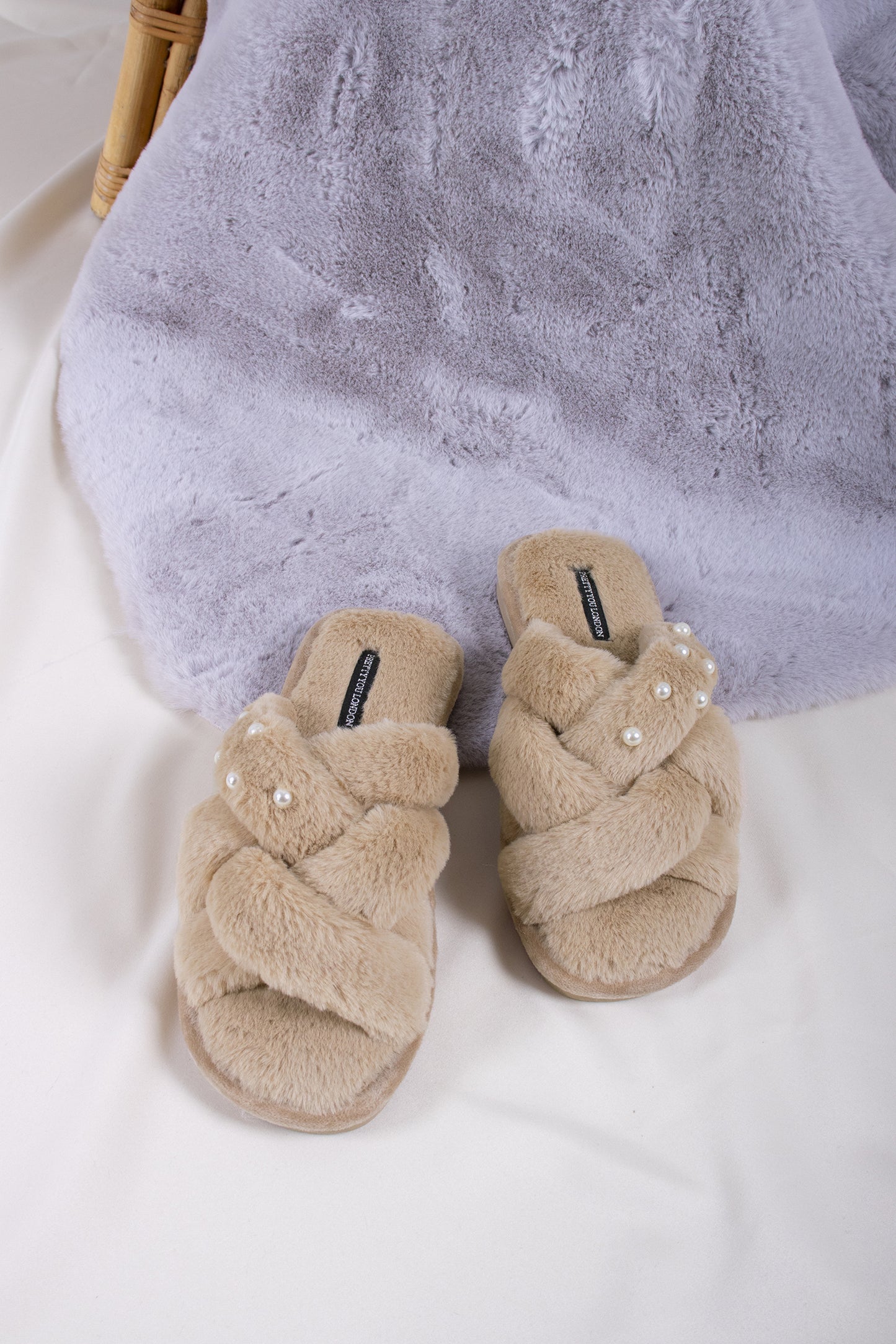 
                  
                    Florence women's slider slippers in camel with faux fur criss-cross lattice straps and pearlescent beads from Pretty You London
                  
                