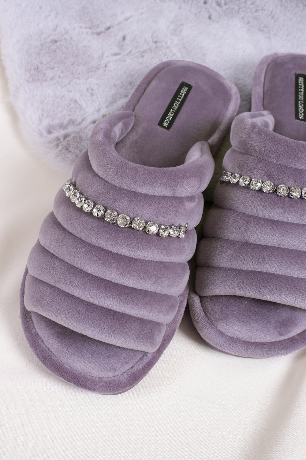 Frankie women's slider slippers in lavender combining super-soft microfibre materials with a glistening crystal diamante strap from Pretty You London